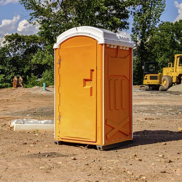 how often are the portable restrooms cleaned and serviced during a rental period in Menominee County Michigan